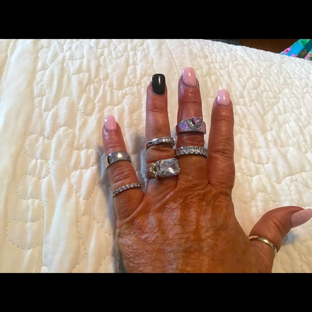 A group of six costume rings.